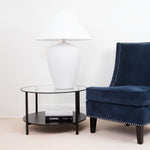 Bianca Oversized Lamp styled on glass side table with navy accent chair