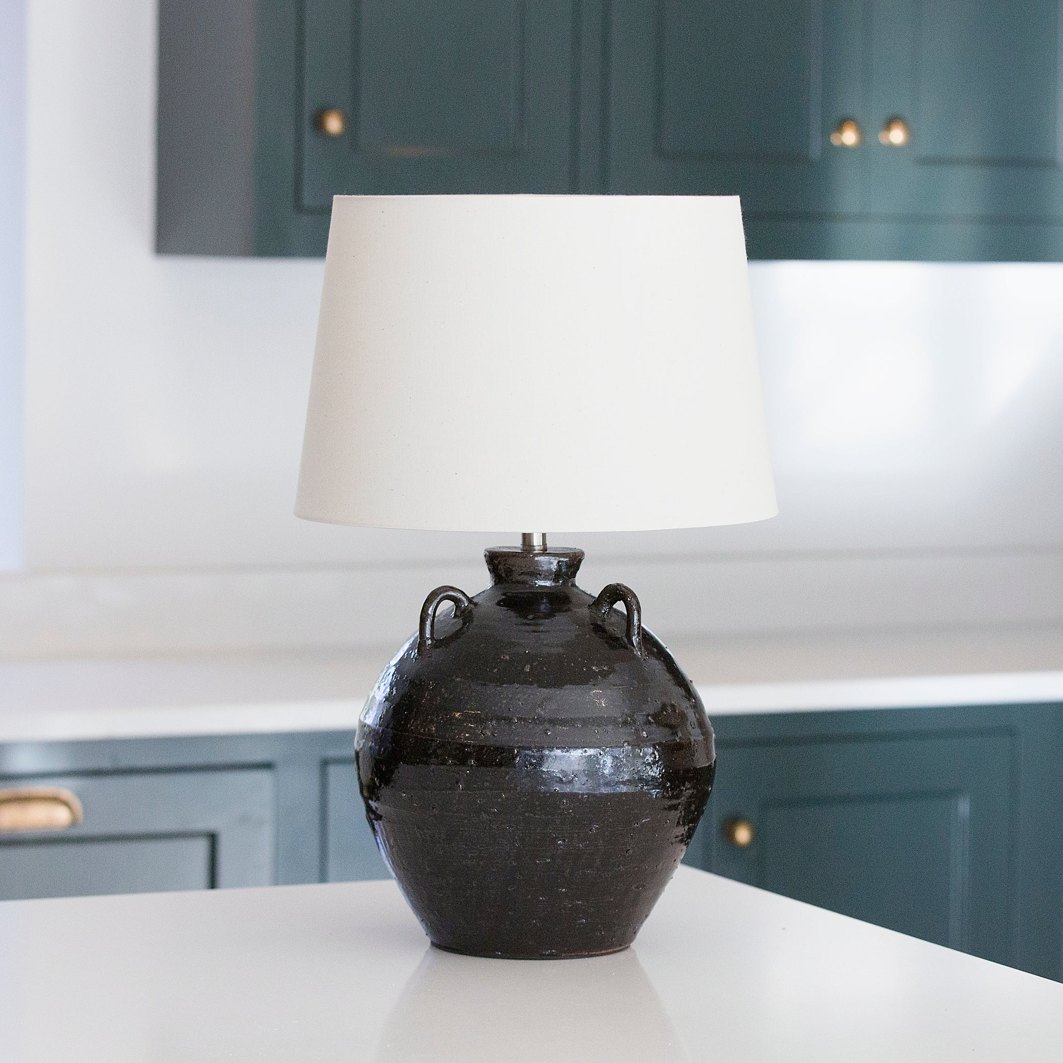 Lamp with an urn-shaped base
