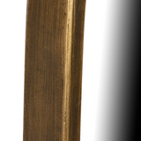 Asymmetrical mirror with gold rim