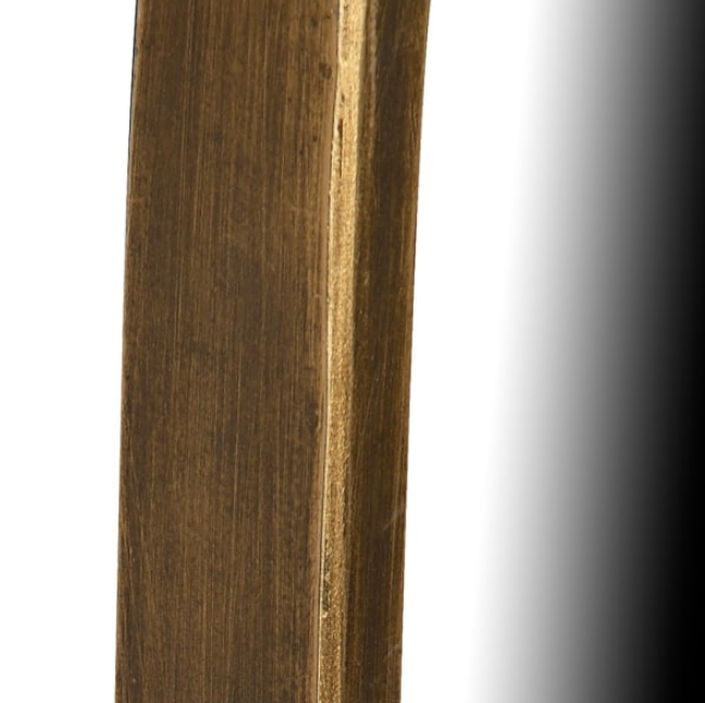 Asymmetrical mirror with gold rim