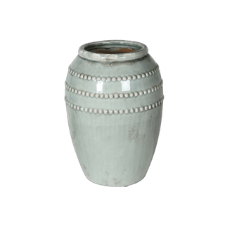 Ceramic vase with decorative bead pattern on a transparent background
