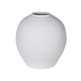 white ceramic flower vase