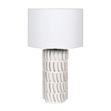Crafted with white tiles that highlight its base, this lamp is finished with a sleek white shade.