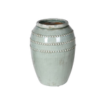 This stunning sage green vase features bobble detailing and a rustic finish. 