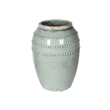 This stunning sage green vase features bobble detailing and a rustic finish. 