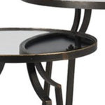 A beautiful set of two nesting tables finished crafted from metal and finished in warm bronze tones finished with a mirror top.