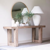 A stunning oversized very pale grey ceramic base with a large hat shade in white.